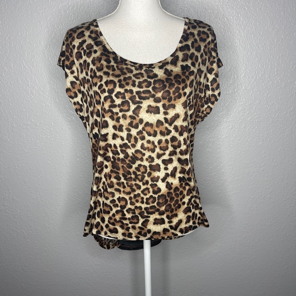 Animal print top with‎ black sheer piece on back